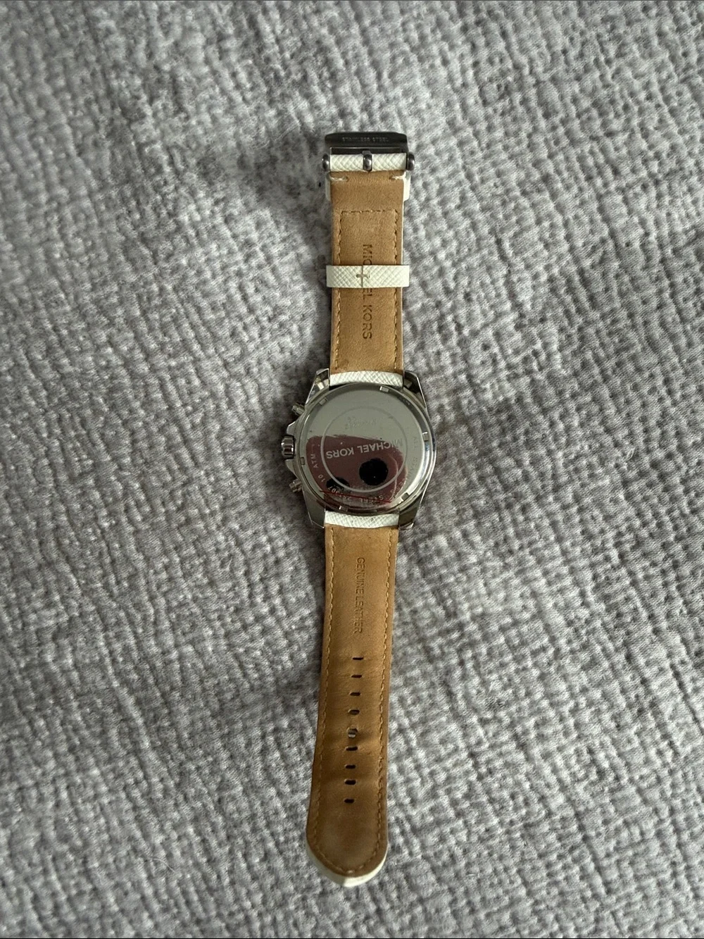 Michael Kors women’s White and silver/Gold Chronograph Leather Strap Watch